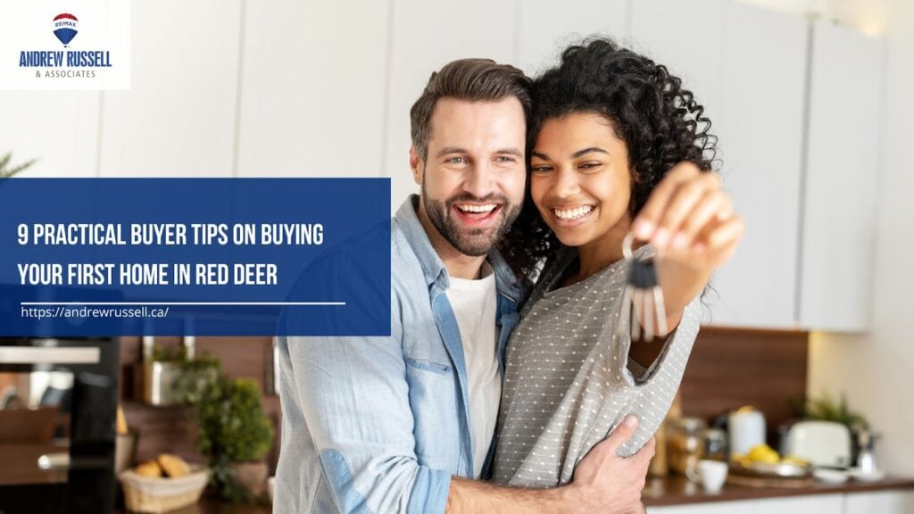 happy young couple holding key to new home